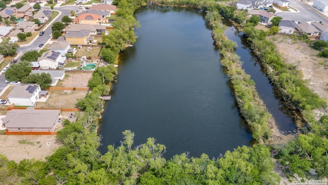 bird's eye view with a water view and a residential view