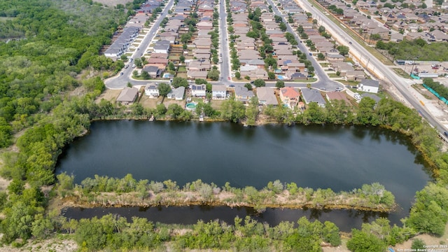aerial view featuring a water view and a residential view