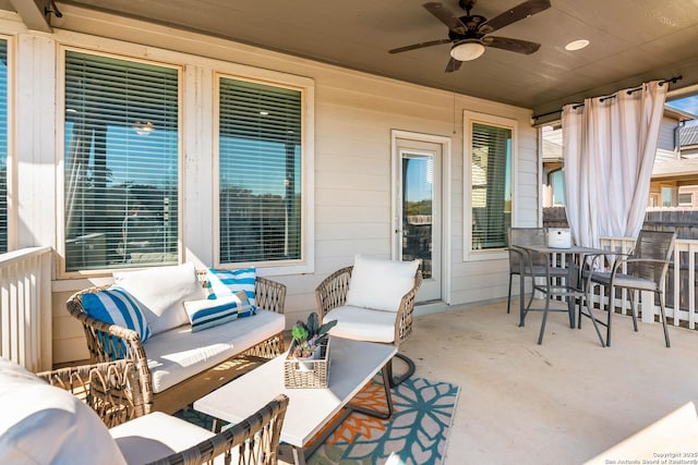 view of patio / terrace featuring an outdoor hangout area, outdoor dining area, and ceiling fan