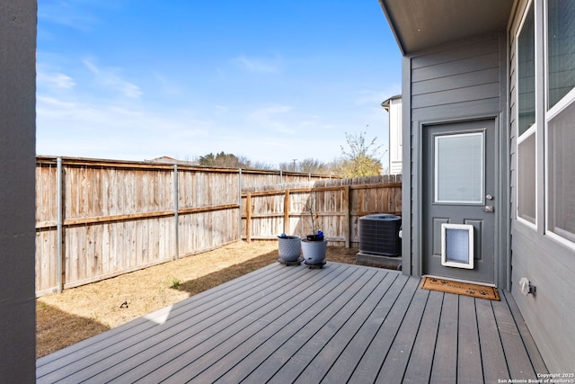 deck featuring central AC unit and a fenced backyard