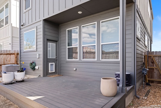 wooden terrace with central AC and fence