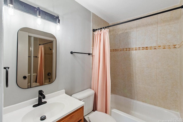 full bathroom with vanity, toilet, and shower / tub combo with curtain