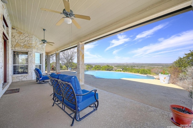 view of patio / terrace featuring an outdoor pool