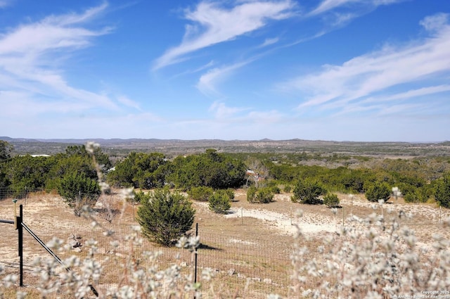 view of mountain feature with a rural view