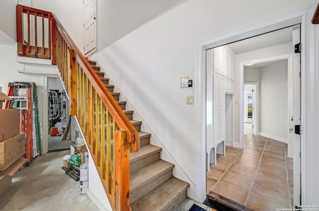 stairway with baseboards