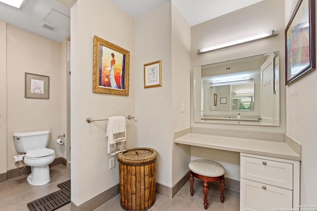 bathroom with tile patterned floors, visible vents, toilet, and baseboards