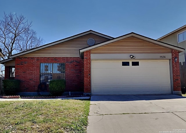 ranch-style home featuring a front lawn, an attached garage, brick siding, and driveway