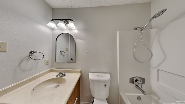 full bathroom featuring shower / bathing tub combination, toilet, and vanity