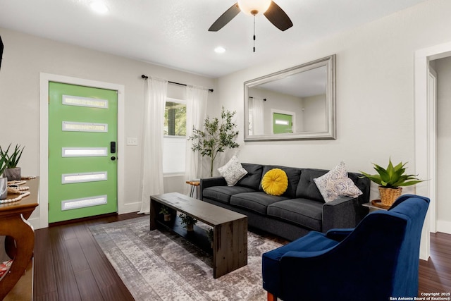 living area with ceiling fan, baseboards, wood finished floors, and recessed lighting