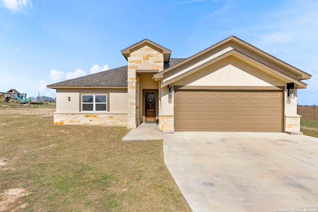 view of front facade with a front lawn, stucco siding, a garage, stone siding, and driveway