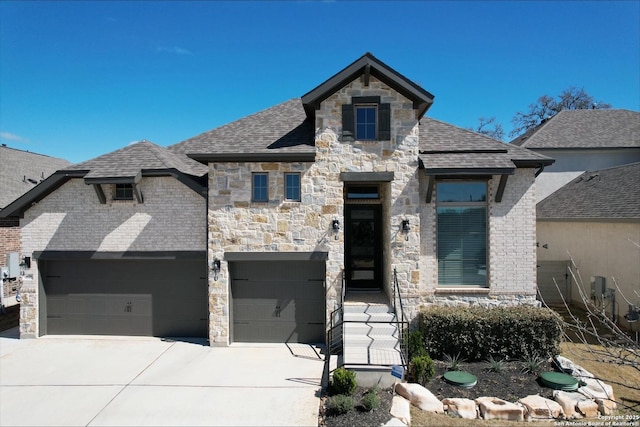 576 Tobacco, New Braunfels, TX 78132 - french country style house featuring stone siding, a shingled roof, and concrete driveway