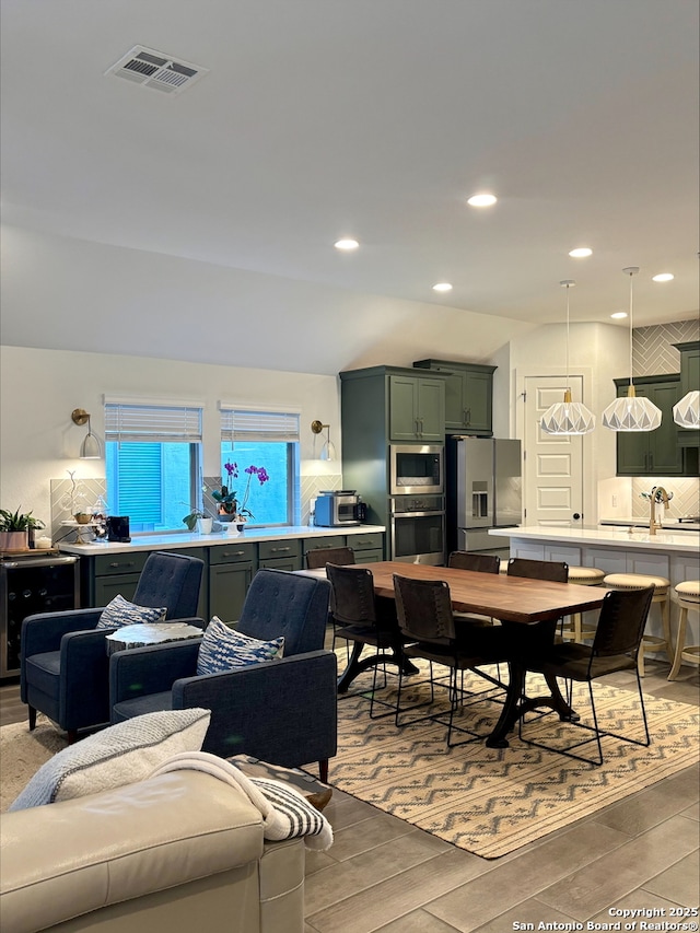 dining area with recessed lighting and visible vents