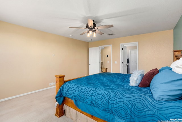 carpeted bedroom featuring a ceiling fan, baseboards, and visible vents