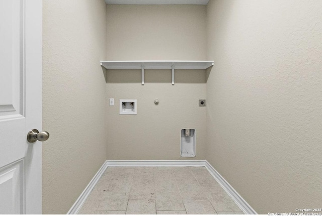 clothes washing area featuring baseboards, gas dryer hookup, washer hookup, laundry area, and hookup for an electric dryer