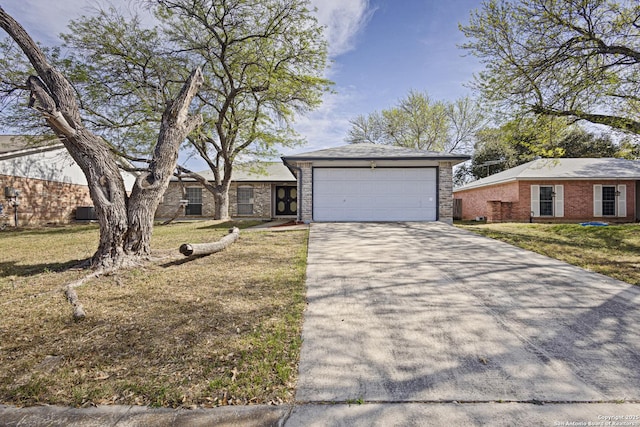 view of front facade featuring a garage, brick siding, concrete driveway, and a front lawn