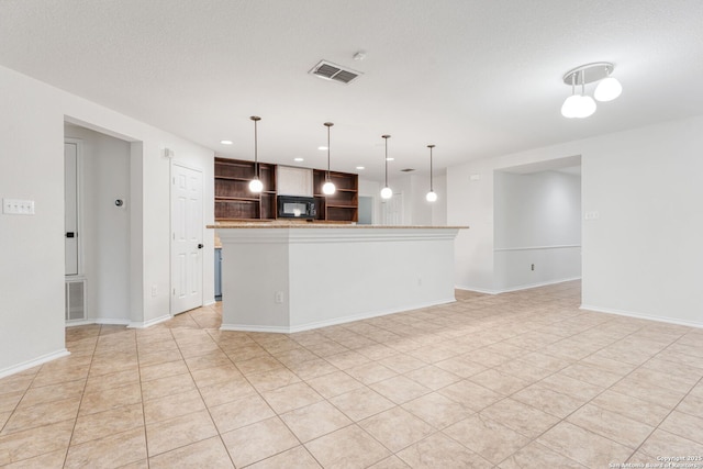 unfurnished living room featuring recessed lighting, baseboards, and visible vents