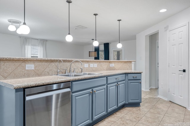 kitchen with a sink, decorative backsplash, light countertops, stainless steel dishwasher, and blue cabinets