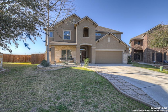 traditional-style house featuring an attached garage, fence, stucco siding, stone siding, and driveway