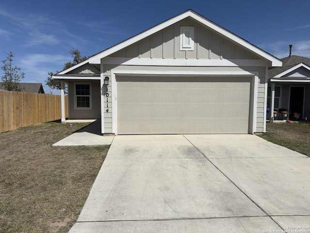 ranch-style house featuring fence, board and batten siding, and driveway