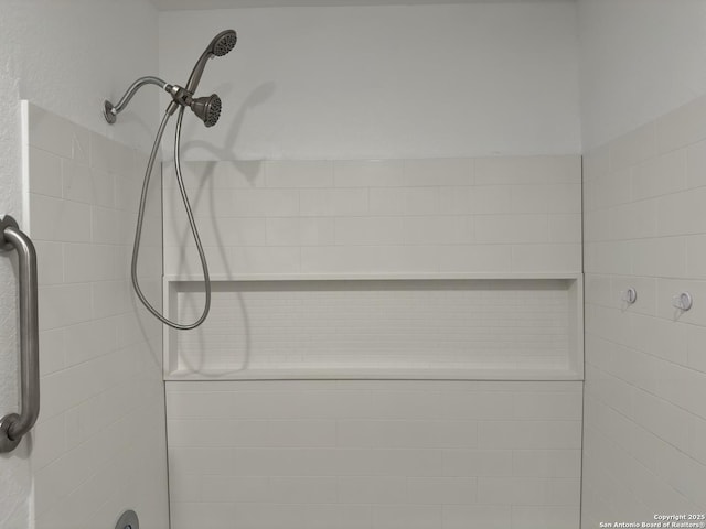 room details with a tile shower