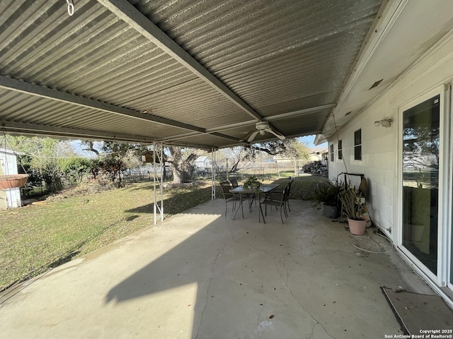 view of patio / terrace featuring outdoor dining space and fence