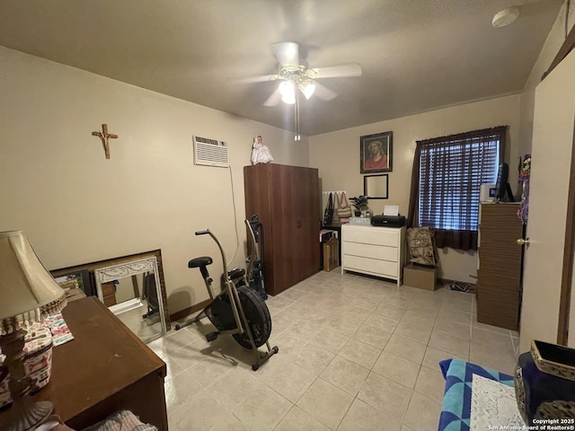 bedroom featuring light tile patterned floors, visible vents, and ceiling fan