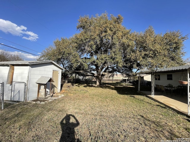 view of yard with a patio and fence