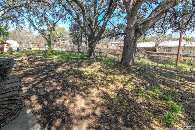 view of yard featuring fence