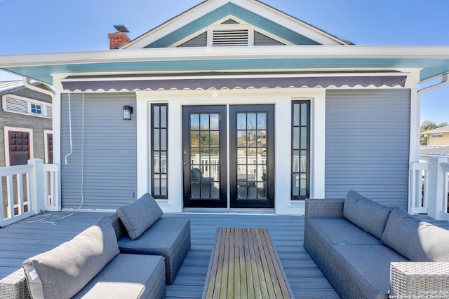 exterior space with french doors, an outdoor hangout area, and a deck