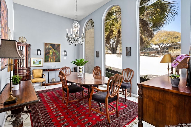 dining area with a chandelier