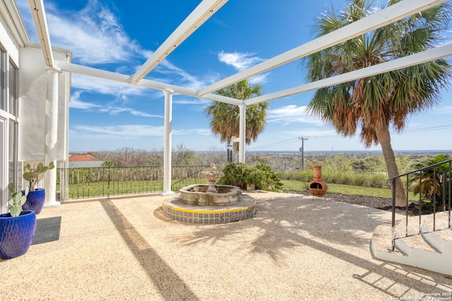 view of patio / terrace with glass enclosure