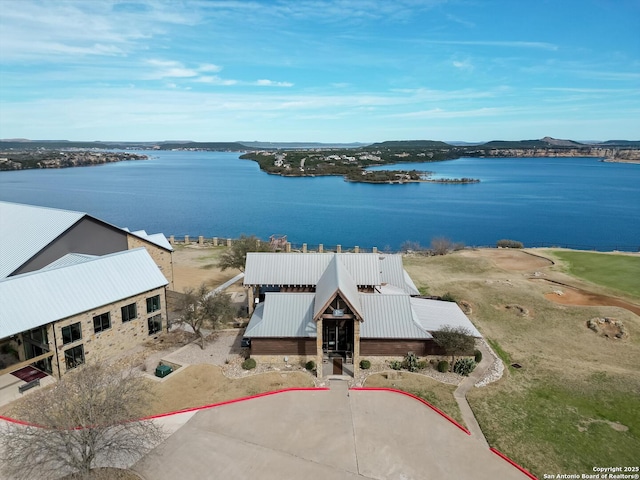 birds eye view of property featuring a water view