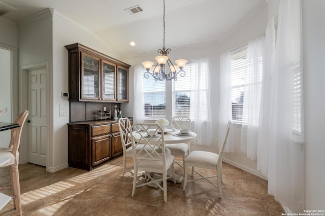 dining room featuring an inviting chandelier, vaulted ceiling, visible vents, and ornamental molding