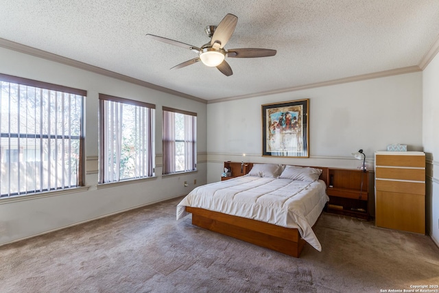 carpeted bedroom with a textured ceiling, ceiling fan, and ornamental molding