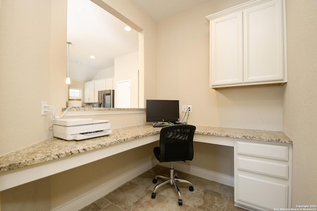 tiled home office with recessed lighting, built in study area, baseboards, and vaulted ceiling