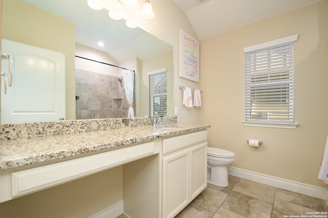 bathroom featuring baseboards, toilet, a shower with shower curtain, and lofted ceiling
