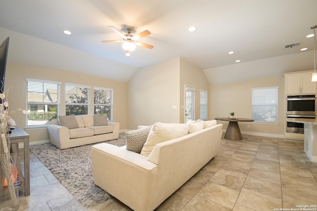 living area featuring visible vents, recessed lighting, baseboards, ceiling fan, and vaulted ceiling