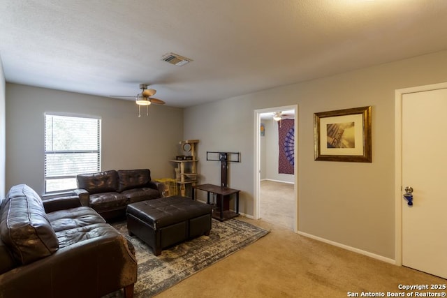 7326 Roveen, San Antonio, TX 78244 - living room featuring visible vents, baseboards, carpet, and a ceiling fan