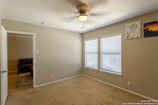 7326 Roveen, San Antonio, TX 78244 - carpeted empty room with baseboards and a ceiling fan