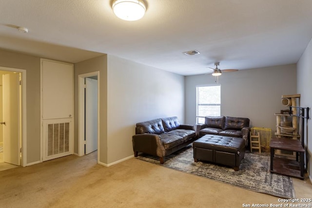 7326 Roveen, San Antonio, TX 78244 - living area featuring visible vents, baseboards, ceiling fan, and carpet floors