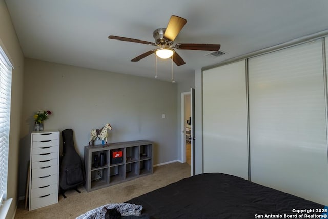 7326 Roveen, San Antonio, TX 78244 - bedroom featuring visible vents, a ceiling fan, a closet, and carpet flooring