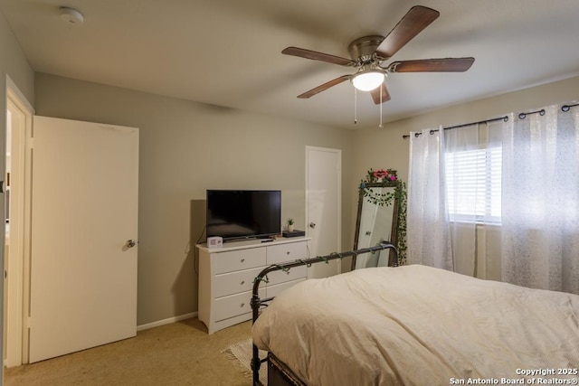 7326 Roveen, San Antonio, TX 78244 - bedroom featuring a ceiling fan, baseboards, and light carpet