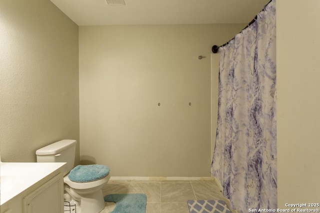 7326 Roveen, San Antonio, TX 78244 - bathroom featuring tile patterned floors, visible vents, toilet, baseboards, and vanity