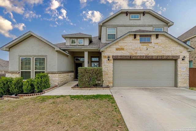 view of front of property featuring stucco siding, stone siding, a garage, and driveway