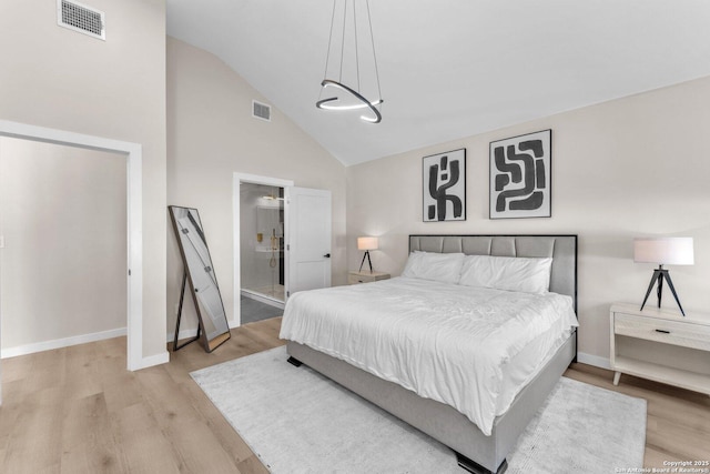 bedroom with visible vents, baseboards, and light wood-style floors