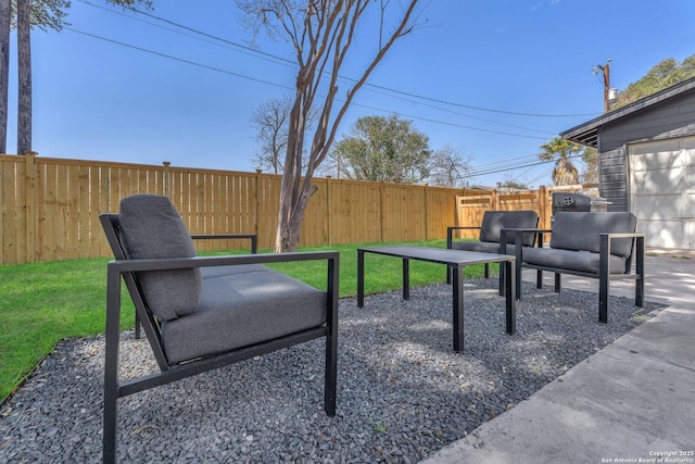 view of patio / terrace featuring fence