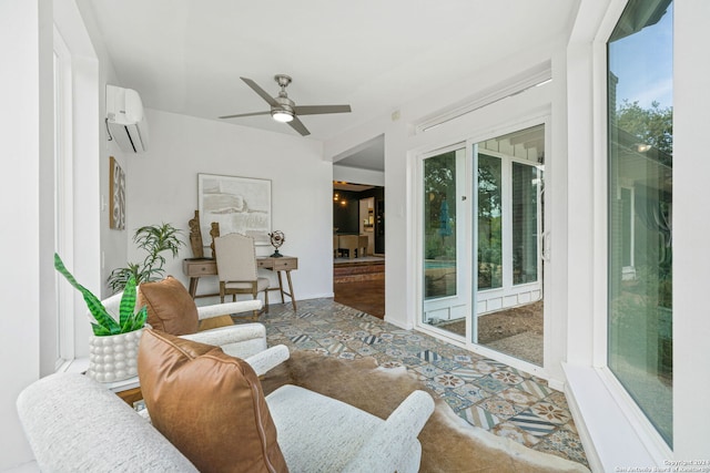 sunroom with a ceiling fan and a wall unit AC