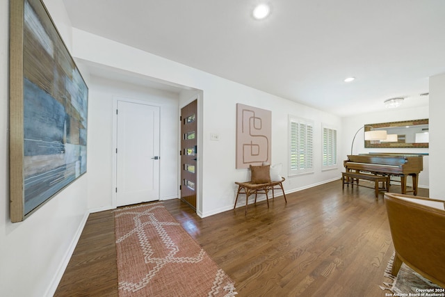 entrance foyer featuring recessed lighting, wood finished floors, and baseboards