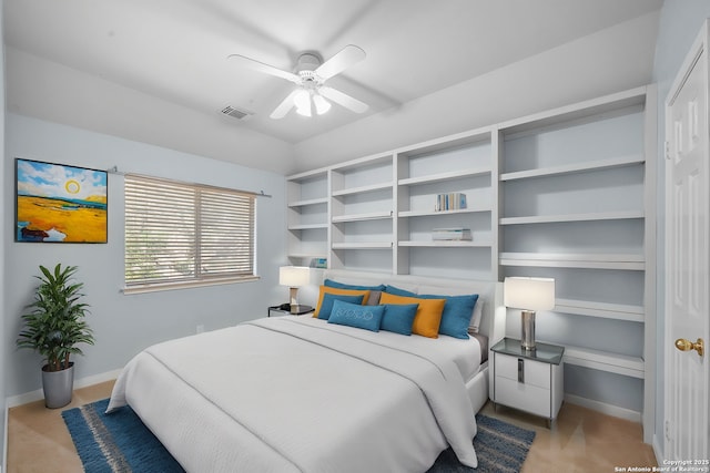 bedroom featuring visible vents, baseboards, and a ceiling fan