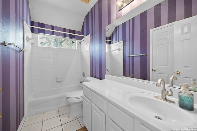 bathroom featuring tile patterned flooring, wallpapered walls, washtub / shower combination, toilet, and vanity